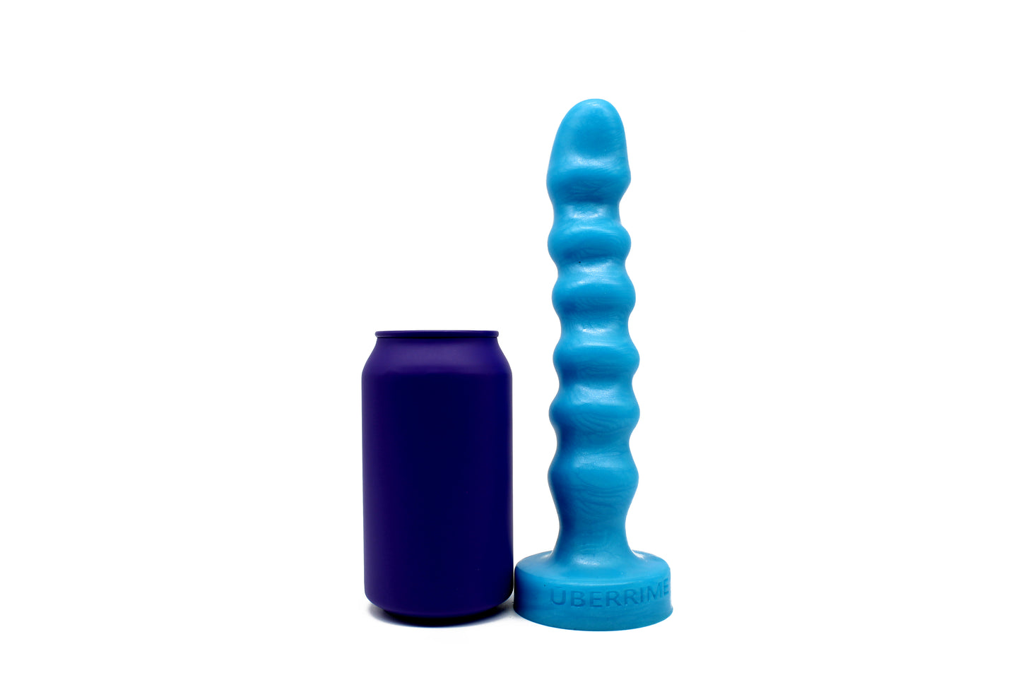 Elegantis Anal Dildo next to a soda can for scale